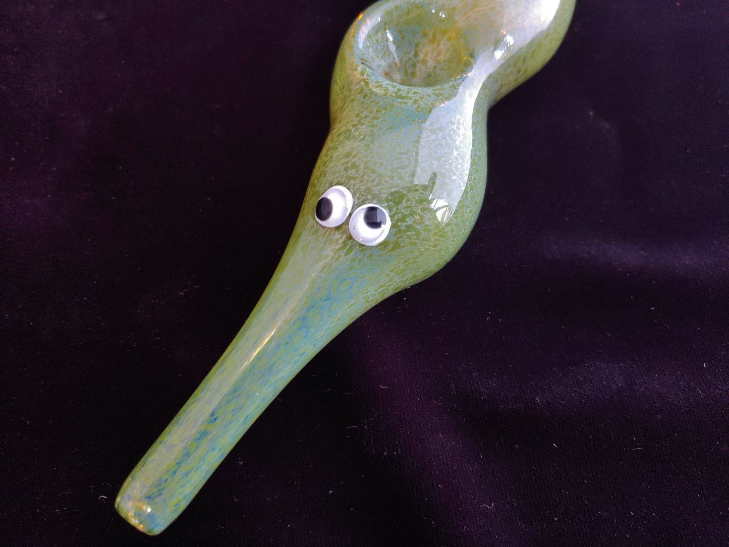 Hand blown glass worm on a string pipe. Unique gift idea.