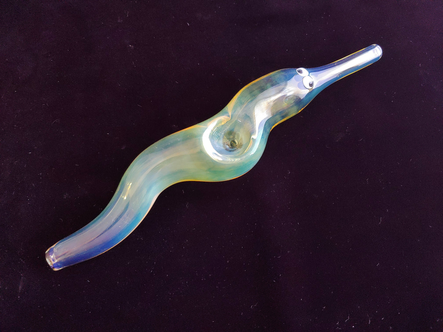 Hand blown glass worm on a string pipe. Unique gift idea.