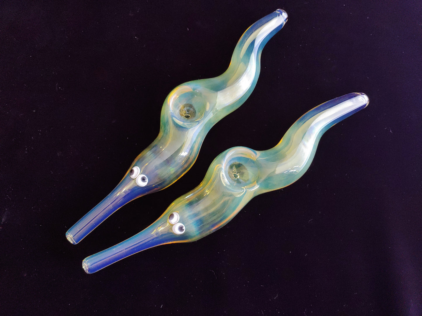 Hand blown glass worm on a string pipe. Unique gift idea.