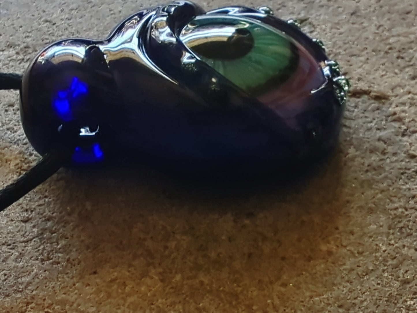 Detailed Glass Eye Pendant - UV Glow