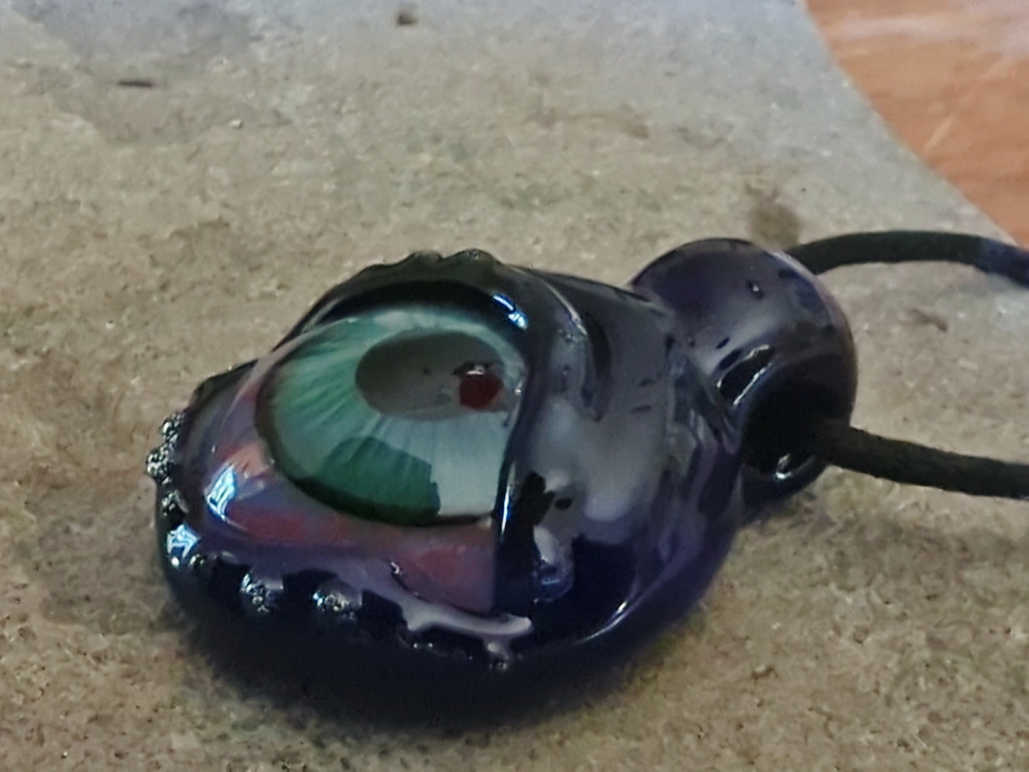 Detailed Glass Eye Pendant - UV Glow
