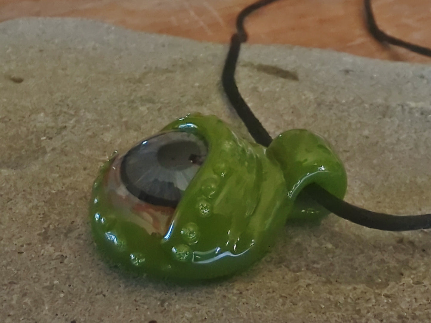 Detailed Glass Eye Pendant - UV Glow