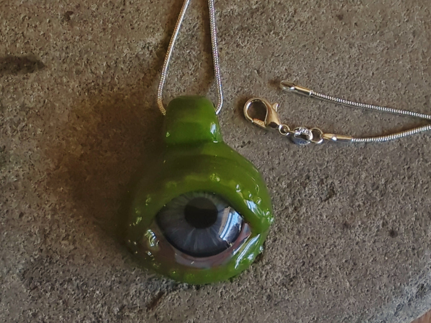 Detailed Glass Eye Pendant - UV Glow