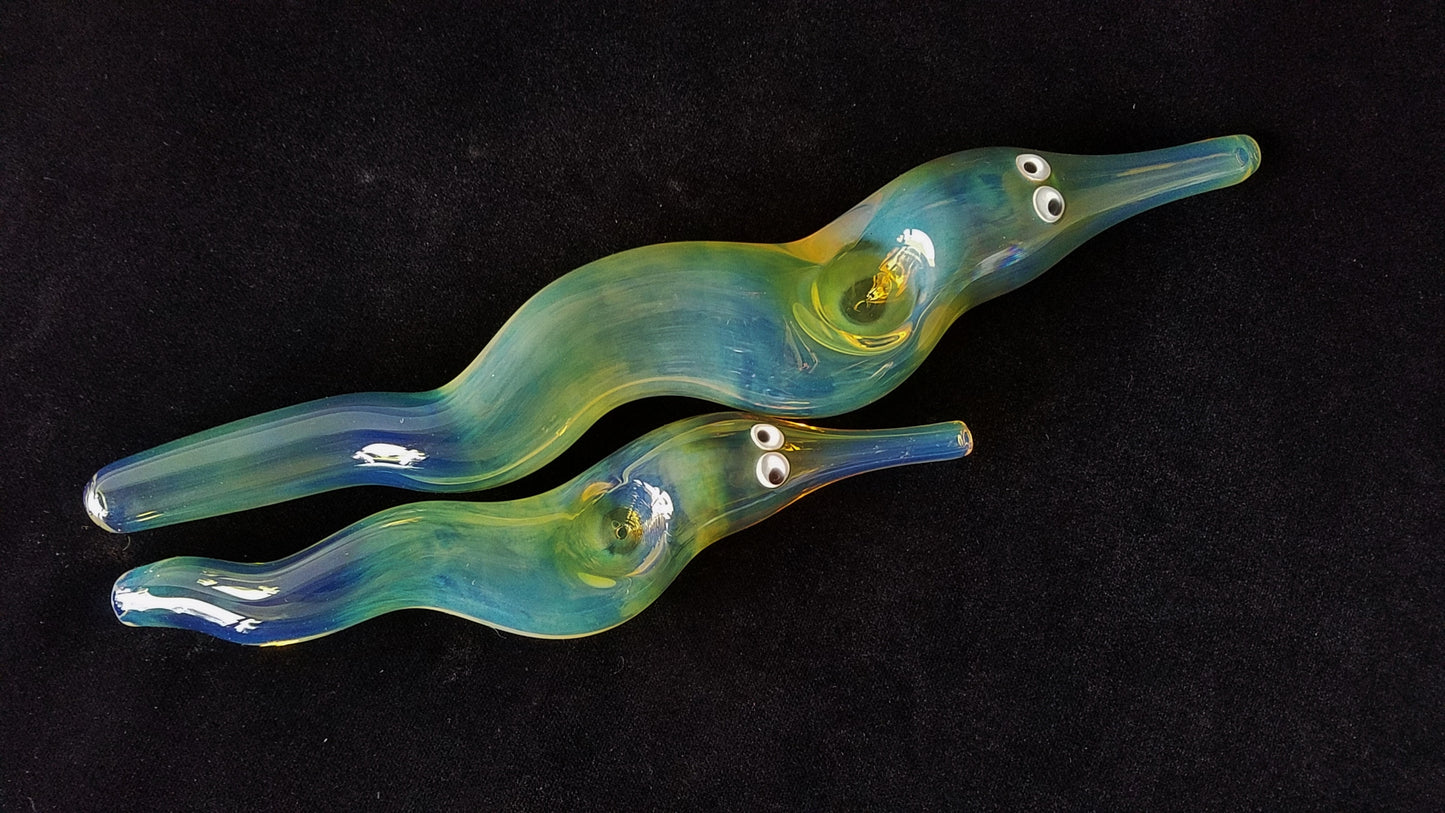 Hand blown glass worm on a string pipe. Unique gift idea.