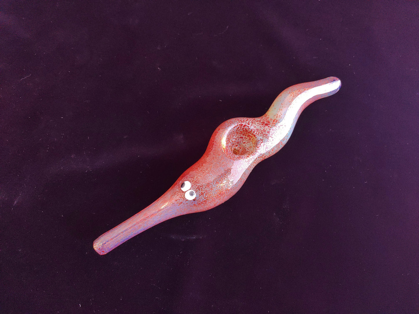 Hand blown glass worm on a string pipe. Unique gift idea.