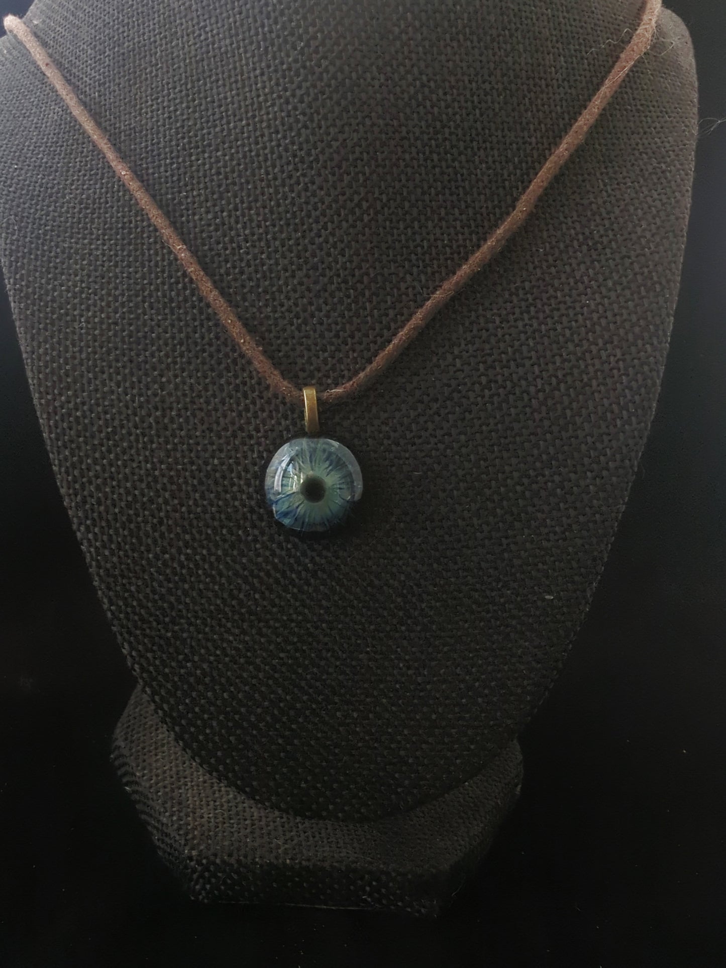 Detailed Glass Eye Pendant