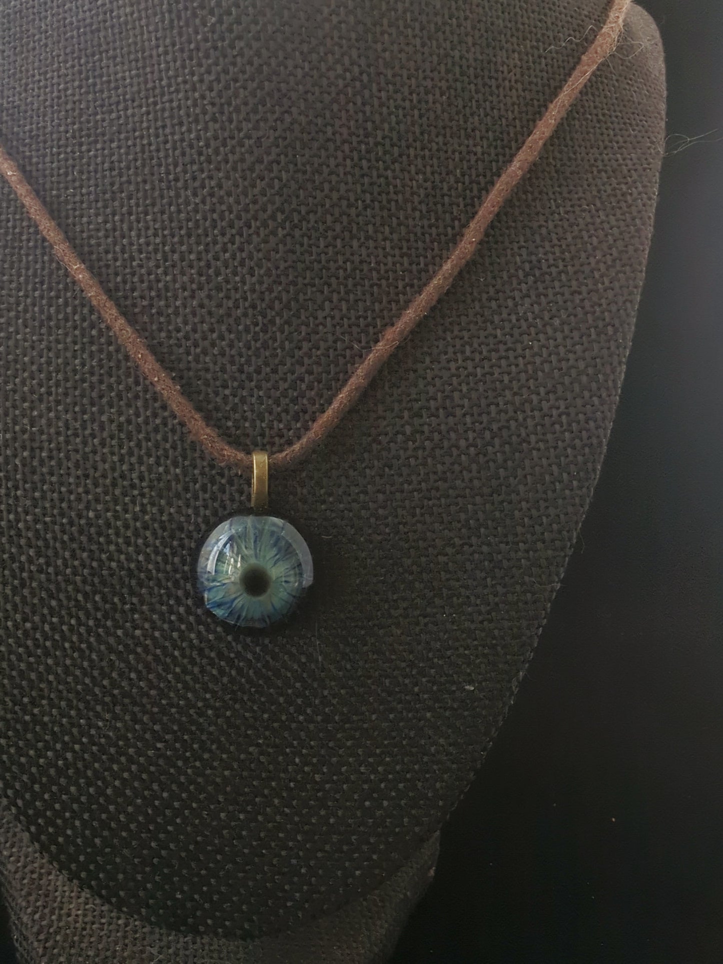Detailed Glass Eye Pendant