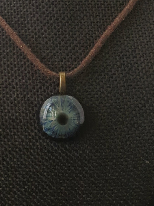 Detailed Glass Eye Pendant