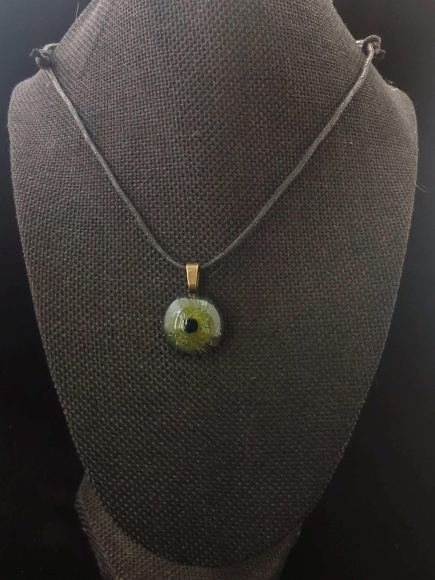 Detailed Glass Eye Pendant