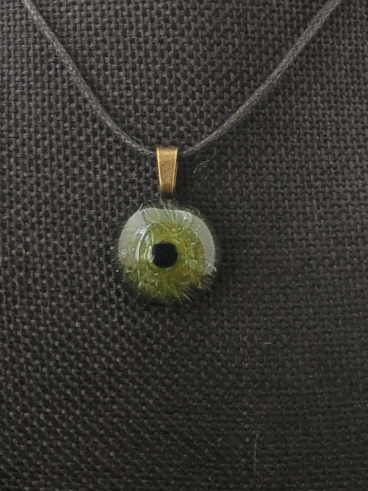 Detailed Glass Eye Pendant