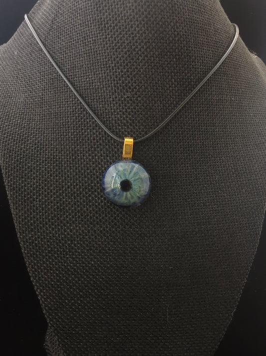 Detailed Glass Eye Pendant