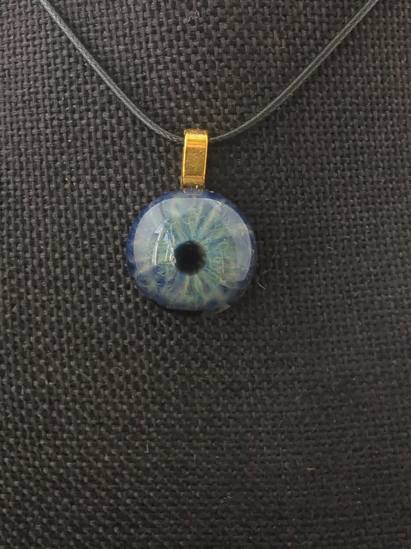 Detailed Glass Eye Pendant